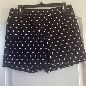 Black shorts with white polka dots
